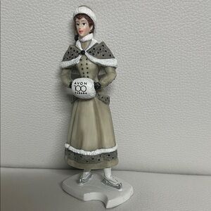 # 26. Small Avon Vintage Figurine in Gray and White